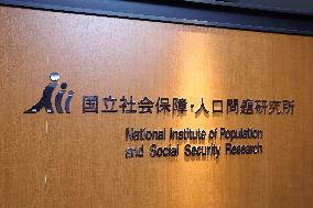 National Institute of Population and Social Security Research signboard and logo